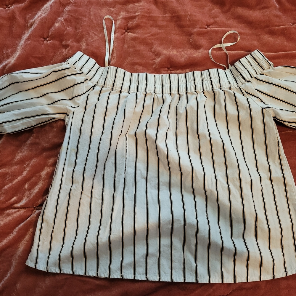 E M blouse off shoulder flared sleeves